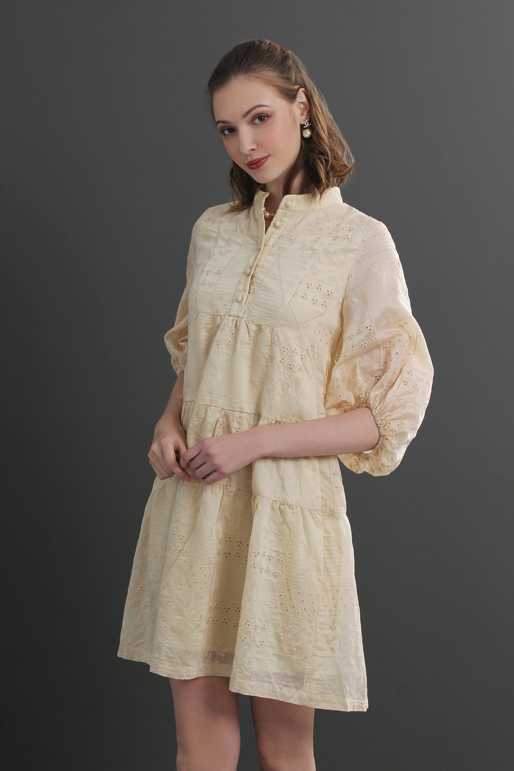 Woman wearing a light yellow dress