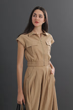 Woman wearing a beige two-piece set 12470118