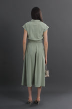 Woman wearing a green dress