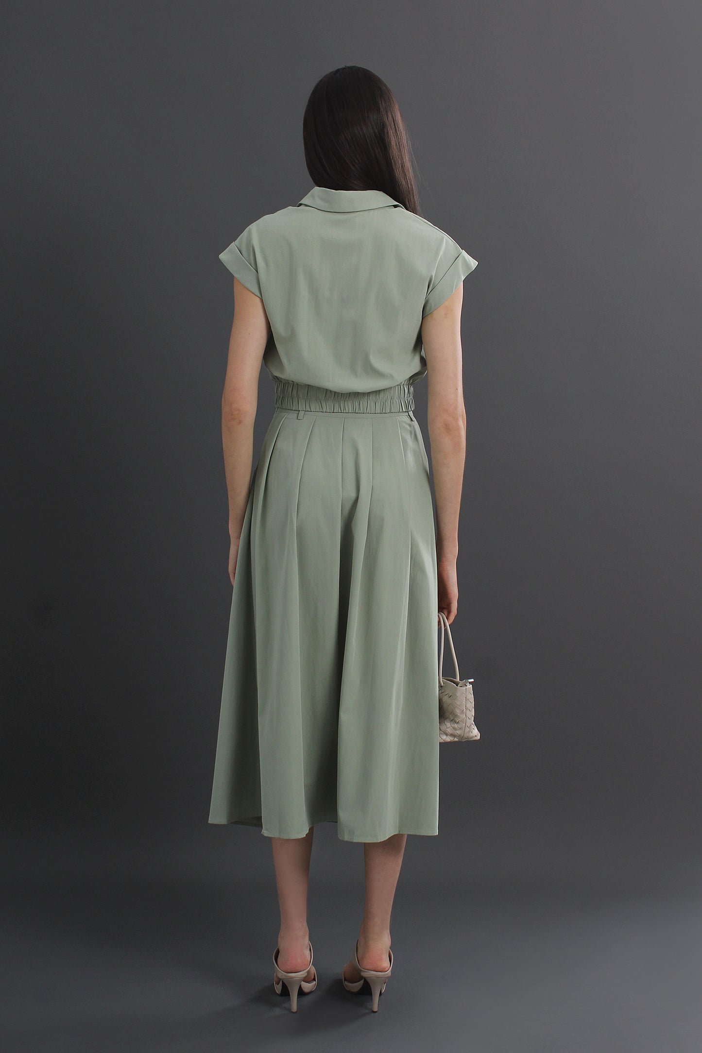 Woman wearing a green dress