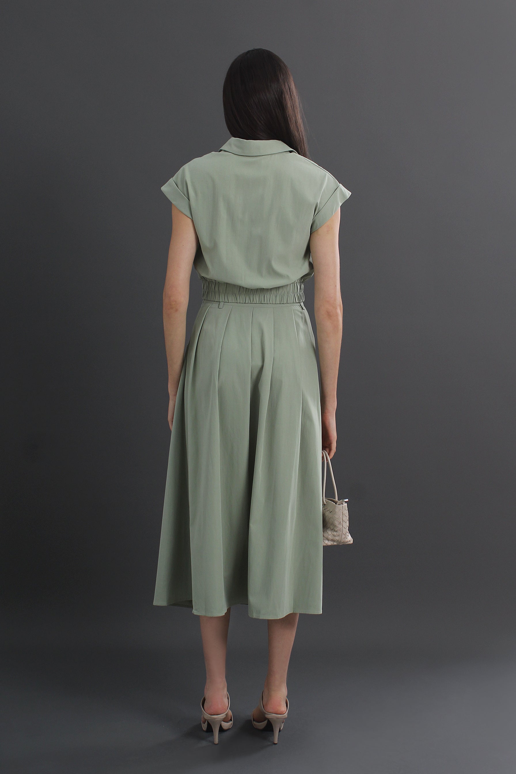 Woman wearing a green dress