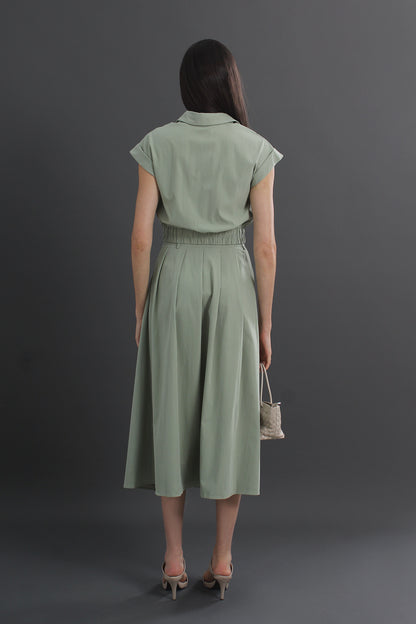 Woman wearing a green dress