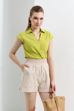 Le Ann Maxima beige linen-blend shorts with elastic waistband and side pockets.