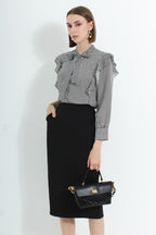 Le Ann Maxima pencil midi skirt in black suiting fabric.