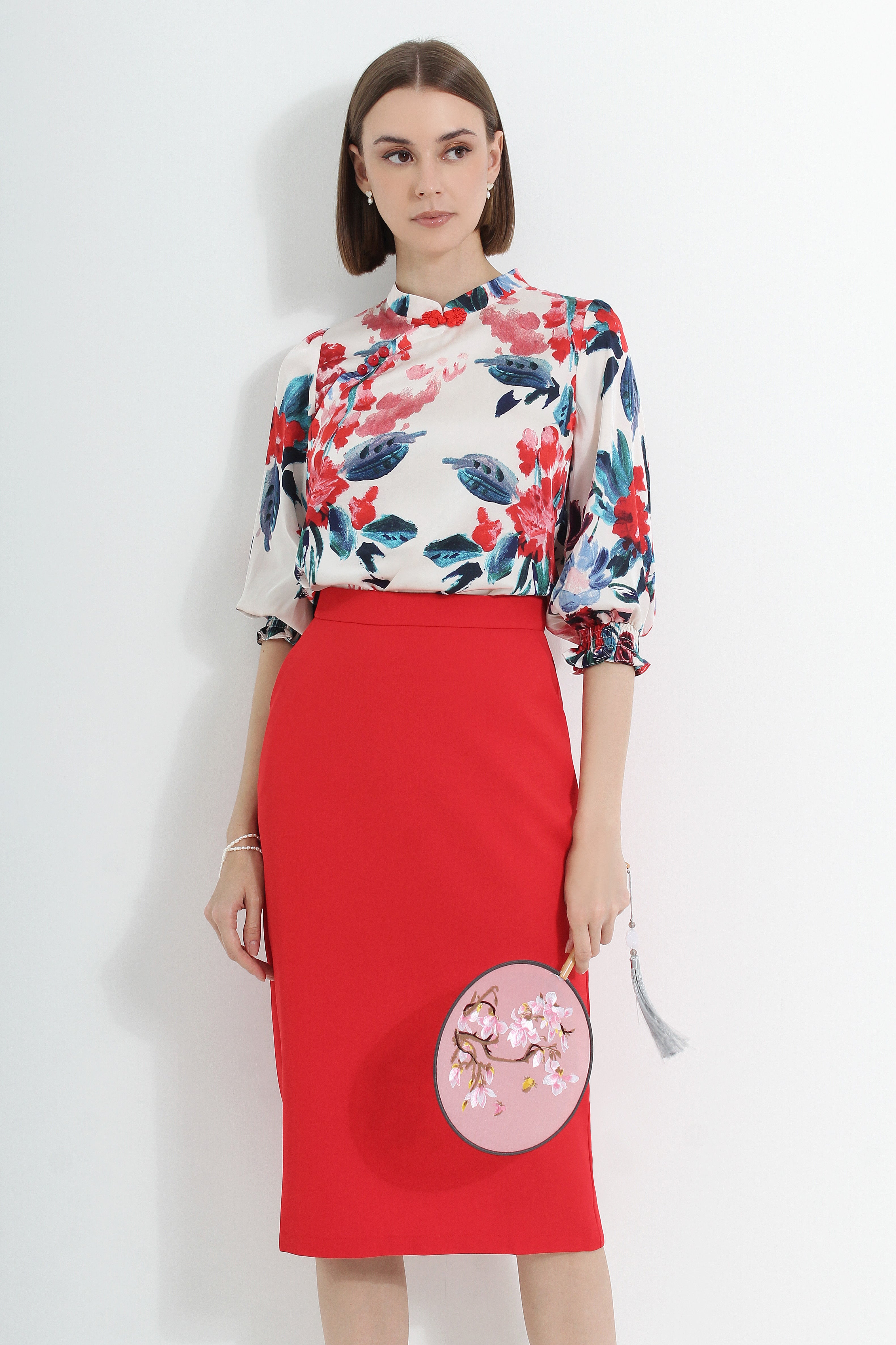 Le Ann Maxima pencil midi skirt in red suiting fabric.