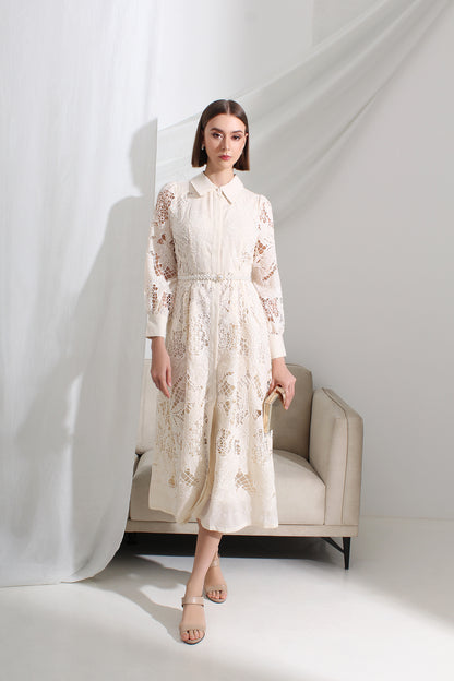 Woman wearing a white lace dress