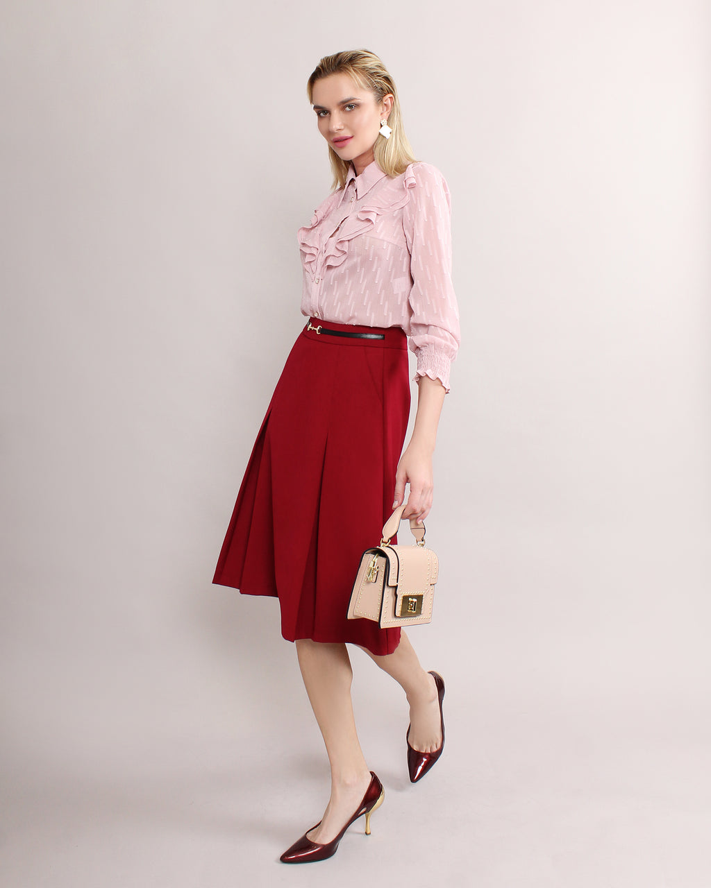 pleated midi skirt in red