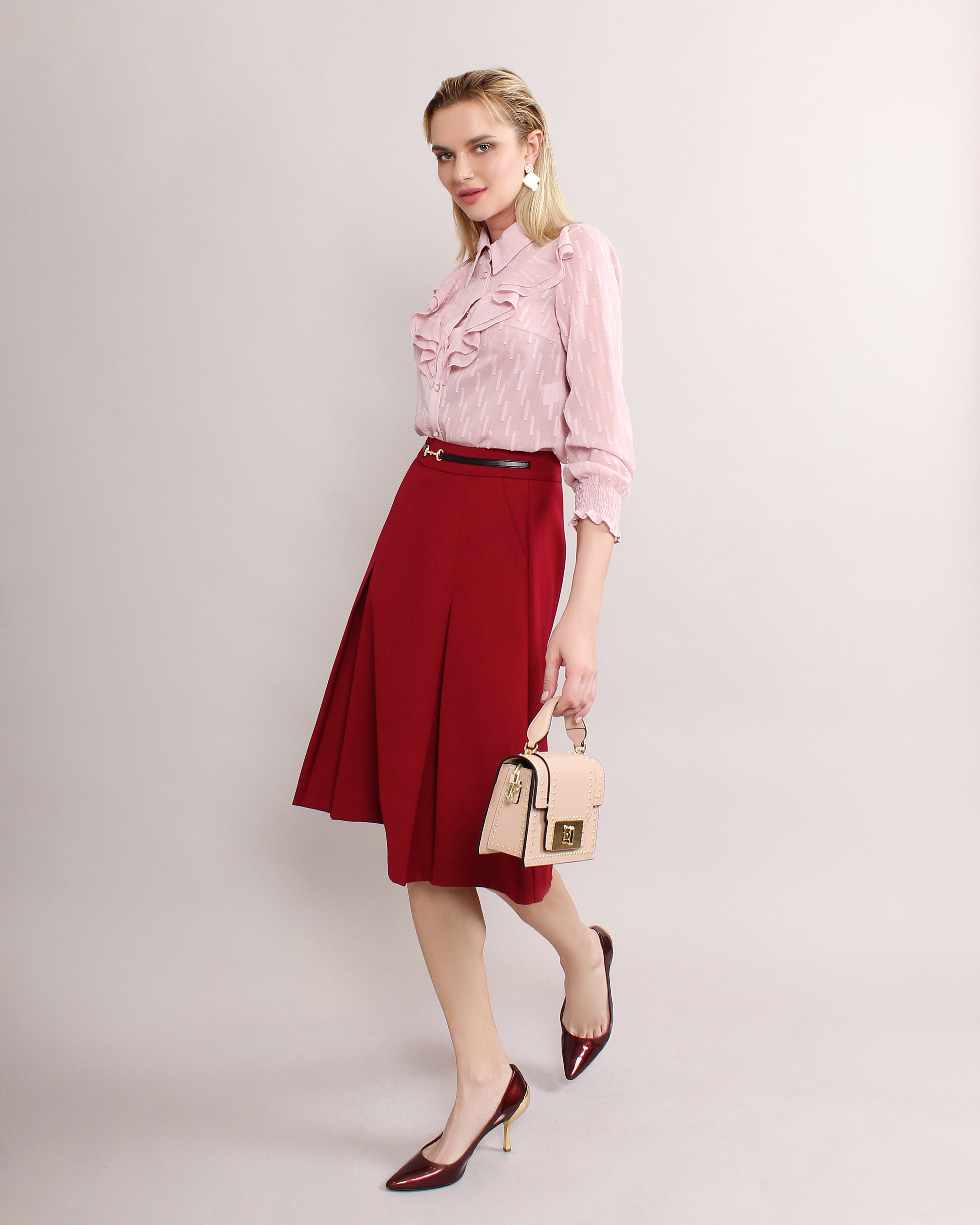 pleated midi skirt in red